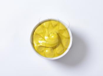 Bowl of smooth Dijon mustard