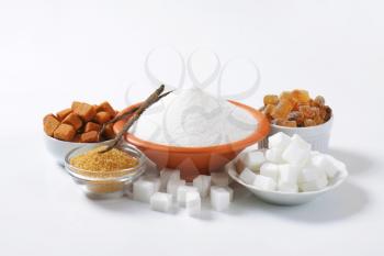 Still life of various types of sugar in bowls