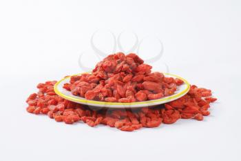 Pile of dried goji berries on plate