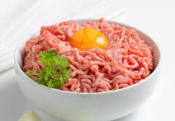 Raw minced meat and yolk in a bowl