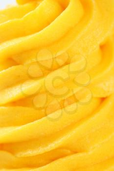 Detail of yellow cream - background