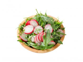 Bowl of rocket salad and sliced radish