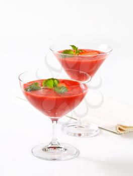 Strawberry cocktails in stemmed glasses
