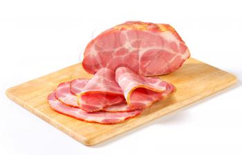 Smoked pork neck on cutting board