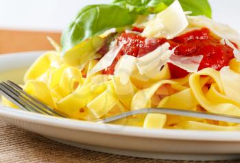 Tagliatelle pasta with tomato puree and Parmesan