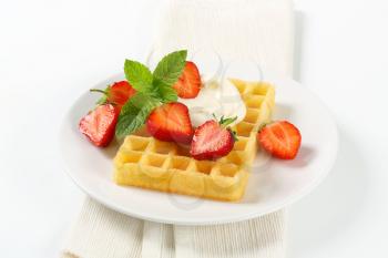 Belgian waffle with fresh strawberries