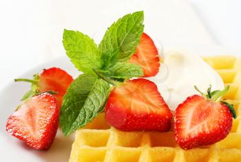 Belgian waffle with fresh strawberries