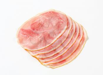 Thin slices of cooked ham