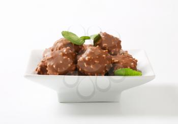 Marzipan nuggets covered with milk chocolate