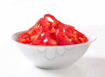 Bowl of sliced red bell pepper