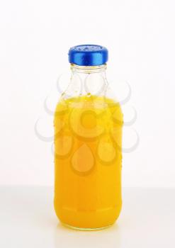 Bottle of orange juice - studio shot