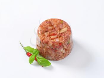 Pork meat with fresh chili pepper in aspic