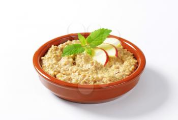 Bowl of white oats porridge