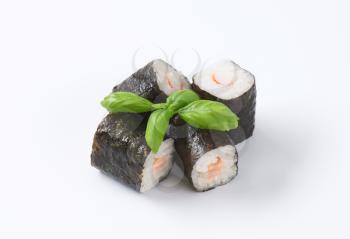 Maki sushi rolls with salmon and crab inside