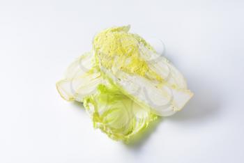 Head of fresh napa cabbage cut into halves