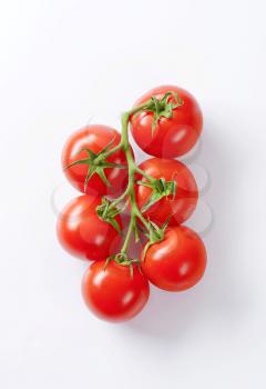 Overhead view of a bunch of red tomatoes