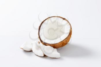 Half a coconut on white background
