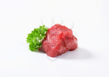 Chunk of raw beef steak on white background