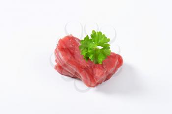Chunk of raw beef steak on white background
