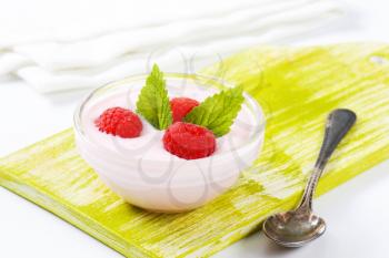 Light raspberry yogurt with fresh raspberries