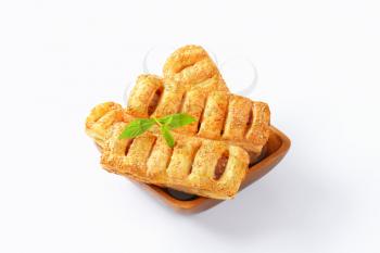 Sausage rolls topped with sesame seeds