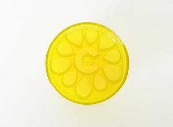 Glass of yellow fruit juice