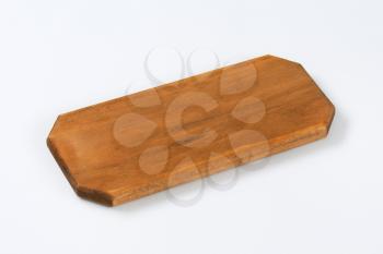 long rectangular wooden cutting board