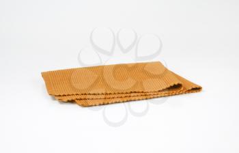 Folded brown cloth place mat
