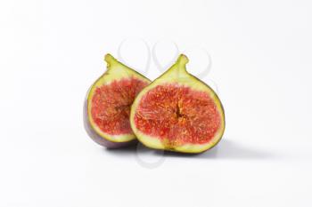 Fresh fig fruit cut into halves