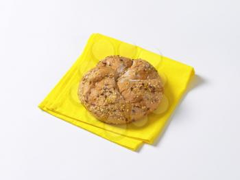 fresh bread bun on yellow place mat