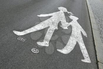 children crossing sign on the road
