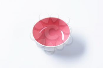 Empty coupe bowl - white on the outside, pink on the inside
