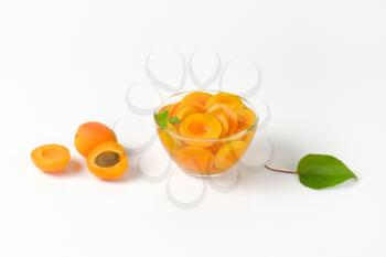 Compote made of halved apricots in light syrup