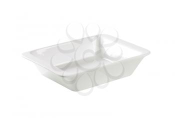 Deep rectangular porcelain dish isolated on white