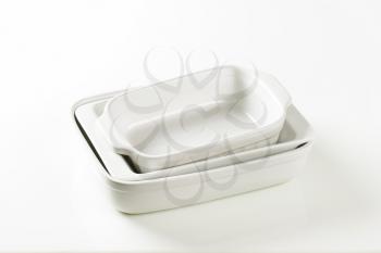 Three rectangular white porcelain baking dishes
