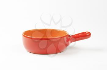Empty glazed terracotta sauce pan