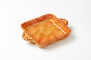 Empty square ceramic baking dish