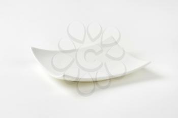 Square porcelain plate on white background