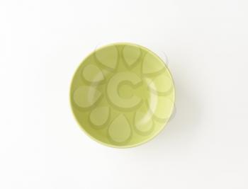 empty green bowl on white background