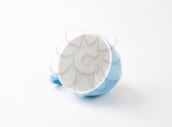 blue tea cup on white background