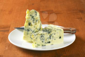 Two wedges of French blue cheese