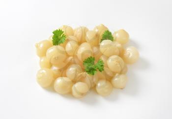 Heap of small pickled onions