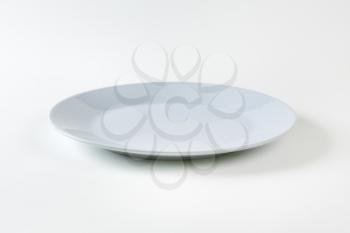 Empty round gray dinner plate