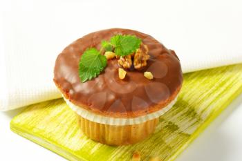 Nut muffin with chocolate glaze