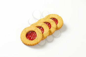 Whole wheat Linzer cookies filled with red currant preserve