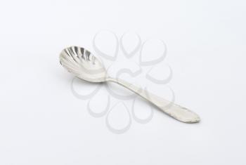 Cheese spoon with finely decorated cup and handle
