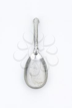 antique serving spoon with decorative handle