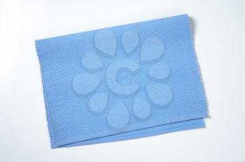 Ribbed solid blue cotton placemat