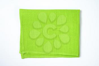 green cotton napkin or place mat