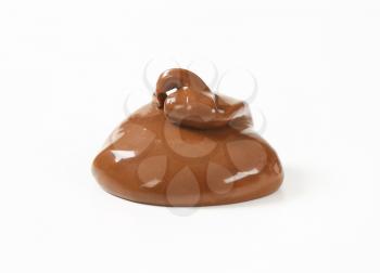 blob of chocolate spread on white background